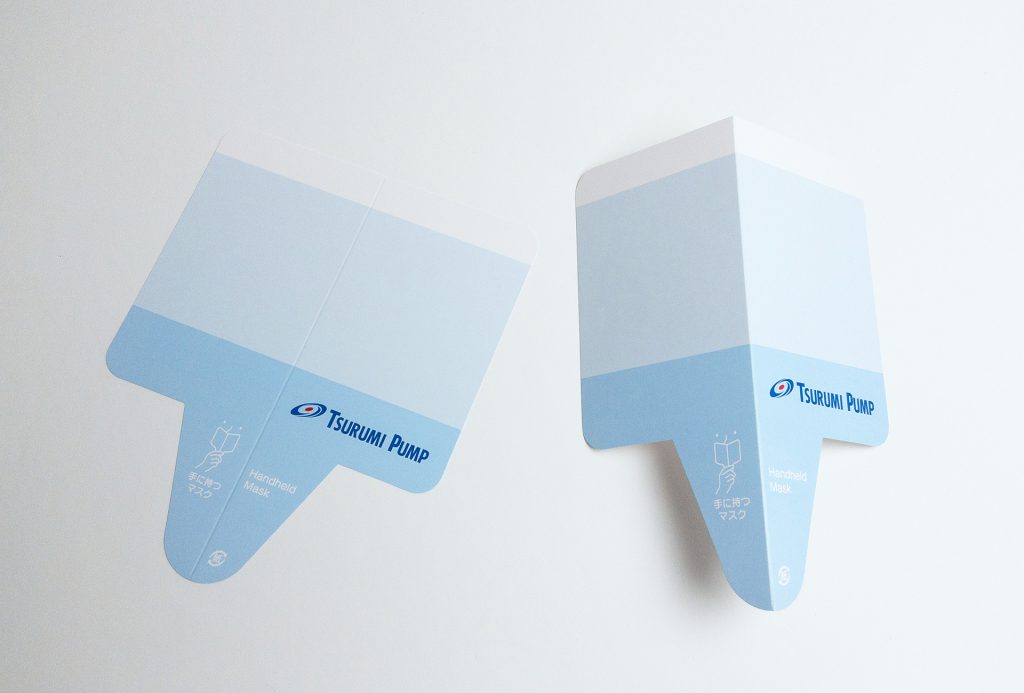 手に持つマスク　鶴見製作所様